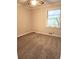 Bedroom with neutral carpet and natural light at 3720 Riviera Dr, Cumming, GA 30041