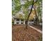 Two-story home with neutral exterior, covered porch, and a stone walkway at 3720 Riviera Dr, Cumming, GA 30041