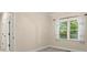 Bedroom with neutral colored walls, carpet floor and a single window offering lots of natural light at 3711 Club Nw Dr, Kennesaw, GA 30144