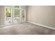 Spacious bedroom with three large windows with blinds allowing ample natural light at 3711 Club Nw Dr, Kennesaw, GA 30144