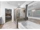 Bathroom with soaking tub and walk-in shower at 7417 Jennadee Dr, Fairburn, GA 30213