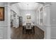Formal dining room with a large table and chandelier at 7417 Jennadee Dr, Fairburn, GA 30213