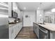 Well-equipped kitchen with sleek countertops, stainless steel appliances, and ample cabinet space at 7417 Jennadee Dr, Fairburn, GA 30213