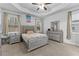 Main bedroom with a silver bed frame and dresser at 7417 Jennadee Dr, Fairburn, GA 30213