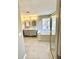 Bright bathroom featuring double vanity, soaking tub, tiled floors, and a separate glass shower at 2610 Woodridge Chase, Canton, GA 30114