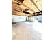 Spacious garage with ample storage, side door entrance and front-facing garage door at 2610 Woodridge Chase, Canton, GA 30114