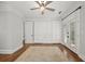Spacious bedroom with built-in cabinetry and French doors at 2960 S Pharr Nw Ct # N2, Atlanta, GA 30305