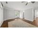 Spacious bedroom with hardwood floors, french doors to a patio, and ample natural light at 2960 S Pharr Nw Ct # N2, Atlanta, GA 30305