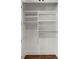 Built-in shelving and hanging rods in closet at 2960 S Pharr Nw Ct # N2, Atlanta, GA 30305
