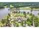 Stunning aerial view of a luxurious home on a golf course with lake access at 3019 Fairway Dr, Villa Rica, GA 30180