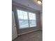 Bedroom with carpet, window with blinds, and natural light at 3019 Fairway Dr, Villa Rica, GA 30180