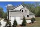 Home with two-car garage, complemented by fresh landscaping and spacious driveway at 3019 Fairway Dr, Villa Rica, GA 30180