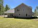 Exterior of home with brick, windows, and green grass at 3019 Fairway Dr, Villa Rica, GA 30180