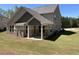The house features an outdoor covered patio, perfect for entertaining guests at 3019 Fairway Dr, Villa Rica, GA 30180