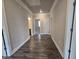 Hallway view with hard surface flooring and neutral paint at 3019 Fairway Dr, Villa Rica, GA 30180