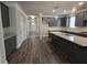 Gourmet kitchen boasts a large center island, stainless steel appliances, and ample counter space at 3019 Fairway Dr, Villa Rica, GA 30180
