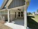 Covered patio with ceiling fan, brick, and siding at 3019 Fairway Dr, Villa Rica, GA 30180