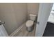 The powder room features tile floors and a modern toilet at 3019 Fairway Dr, Villa Rica, GA 30180