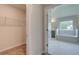 Walk-in closet and bathroom with soaking tub at 26 Homesite Cooper E Cv, Fayetteville, GA 30214