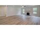 Spacious living room with fireplace and wood-look flooring at 26 Homesite Cooper E Cv, Fayetteville, GA 30214
