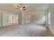 Ample main bedroom with high ceilings and carpet at 26 Homesite Cooper E Cv, Fayetteville, GA 30214