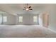 Large main bedroom with high ceilings and ceiling fan at 26 Homesite Cooper E Cv, Fayetteville, GA 30214