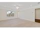 Spacious bedroom with plush carpet, ceiling fan, and large windows at 2881 Grandin Way, Marietta, GA 30008