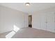 Bedroom with carpeted floors, double door closet, and bright natural light at 2881 Grandin Way, Marietta, GA 30008