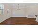 Open dining area with wood flooring and elegant chandelier at 2881 Grandin Way, Marietta, GA 30008