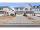 Charming townhome with a two-car garage and well-manicured front yard at 2881 Grandin Way, Marietta, GA 30008