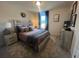 Comfortable bedroom with a beautifully decorated bed, soft textures, and ample natural light at 4341 Portsbrook Ave, Snellville, GA 30039