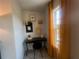 Cozy home office nook with black desk, yellow curtains, and natural light at 4341 Portsbrook Ave, Snellville, GA 30039