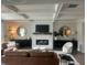 Living room with fireplace, coffered ceilings, hardwood floors and modern decor at 4341 Portsbrook Ave, Snellville, GA 30039