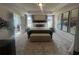 Beautifully decorated main bedroom with decorative molding, neutral paint and large windows at 4341 Portsbrook Ave, Snellville, GA 30039