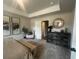 Well-designed main bedroom featuring elegant furnishings, decorative accents and ample natural light at 4341 Portsbrook Ave, Snellville, GA 30039