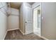Walk-in closet featuring carpet, shelving and a hallway doorway at 4341 Portsbrook Ave, Snellville, GA 30039