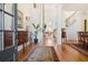 Elegant foyer featuring hardwood floors, a staircase, and decorative furnishings at 6163 Talmadge Nw Run, Acworth, GA 30101