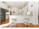 Bright kitchen with stainless steel appliances and counter seating at 6163 Talmadge Nw Run, Acworth, GA 30101