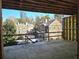 An inviting view through unfinished framework of neighboring houses with traditional architecture and manicured landscaping at 00 Kingsboro Rd # 1, Atlanta, GA 30326