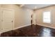 Bedroom with hardwood floors and en-suite bathroom at 1847 New Ne St, Conyers, GA 30012