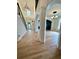 Spacious foyer featuring high ceilings, a staircase, and elegant hardwood floors at 3390 Vista Creek Dr, Dacula, GA 30019