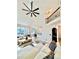 Bright, spacious living room with a large ceiling fan, second story overlook, and hardwood flooring at 3390 Vista Creek Dr, Dacula, GA 30019