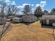 View of the backyard with sheds at 1891 Highway 81 E, Mcdonough, GA 30252
