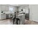 Modern kitchen with stainless steel appliances and an island at 3152 Birdsong Ave, Covington, GA 30016