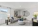 Cozy loft area with gray couch and stylish artwork at 3152 Birdsong Ave, Covington, GA 30016