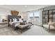 Spacious main bedroom with king-size bed and sitting area at 3152 Birdsong Ave, Covington, GA 30016
