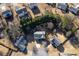 An aerial view shows the well-maintained neighborhood with mature trees and private backyard at 102 River Marsh Ln, Woodstock, GA 30188