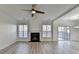 Spacious living room with fireplace and hardwood floors at 2029 Polesdean Trce, Duluth, GA 30097