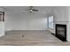 Living room with fireplace and hardwood floors at 2029 Polesdean Trce, Duluth, GA 30097