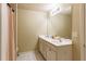 Bright bathroom featuring a double vanity, white tile floors, and neutral colored walls at 2710 Royston Dr, Duluth, GA 30097